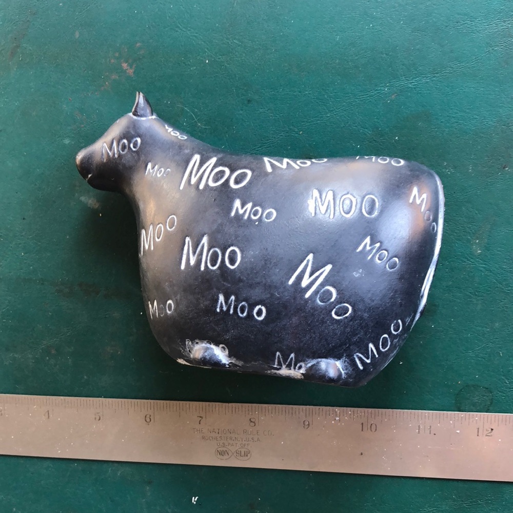 Black and White Cow Figurine